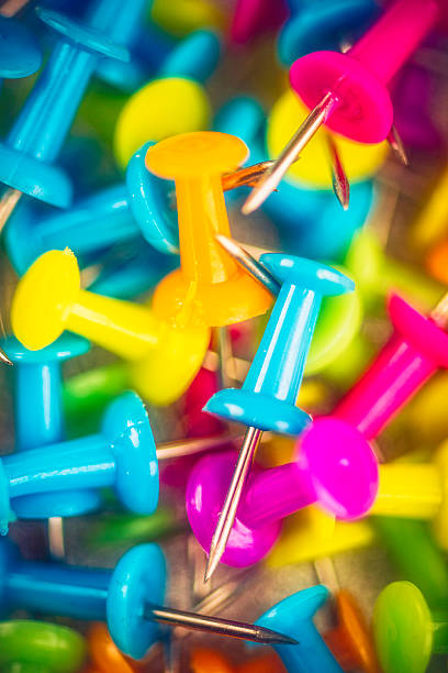 istock Collection of vibrant colored push pins 521698177
