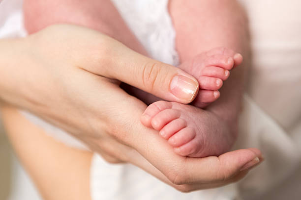 istock baby legs newborn 521699666