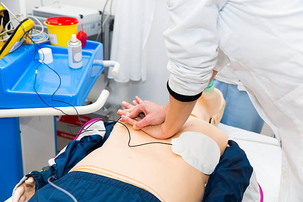istock CPR seminar,doctor performing heart massage of dummy 521701002