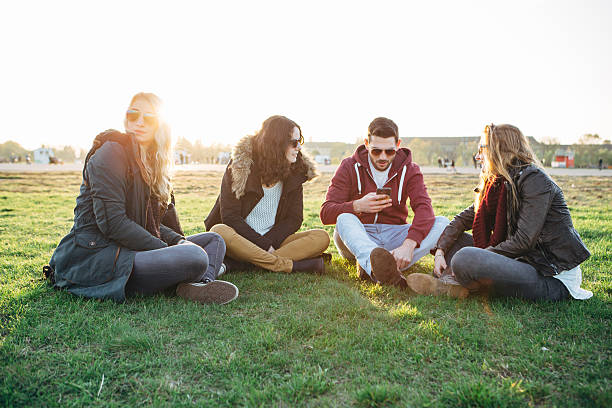 istock teenage group sitting together 521701975