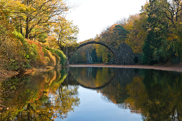 istock Basalt bridge (Rakotzbrücke) in the Kromlauer Park, Germany 521703327