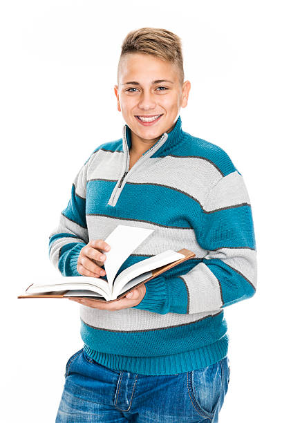 Cute Teenage Student Boy how Holding School Book and smiling, Isolated on White.
