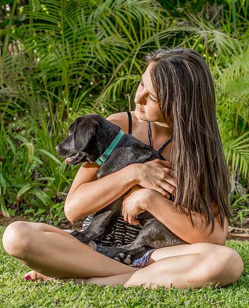 istock Girl with Puppy 521703968