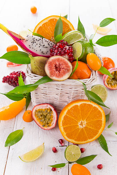 istock Fresh citruses on old wooden table 521706452