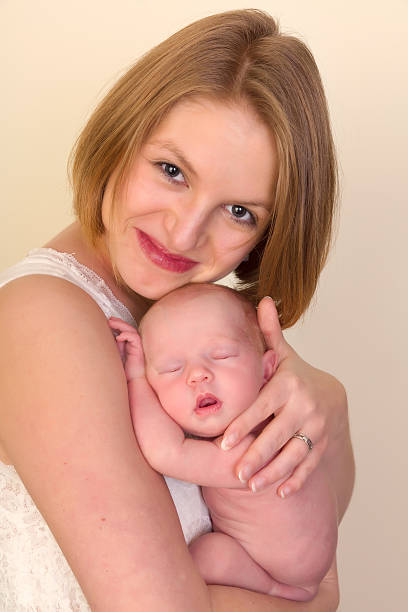 istock Mother with baby smiling 521706872