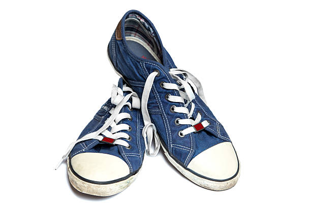 istock denim sneakers on a white background, isolation 521707080