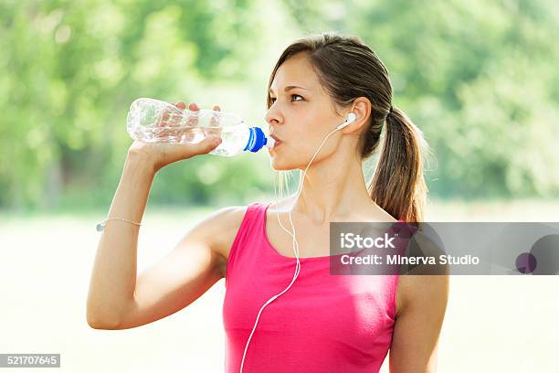 Active Woman Drinking Water Stock Photo - Download Image Now - Activity, Adult, Adults Only