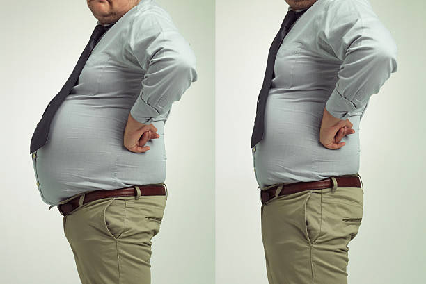 Looking good for work! Before and after studio shot of a businessman's weight loss before and after weight loss man stock pictures, royalty-free photos & images