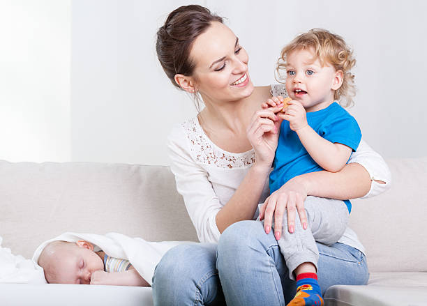 istock Attractive mother and her sons 521709041