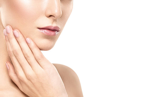 istock Woman shoulders lips hands fingers close-up portrait 521709072