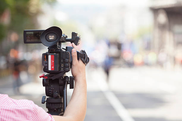 istock Filming an event with a video camera 521713077