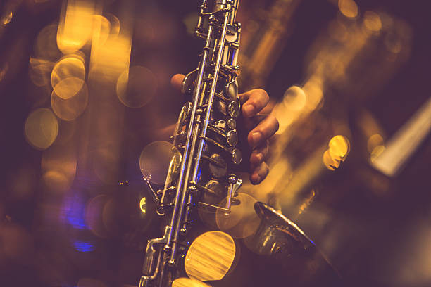 Saxophone Players Saxophone player. performance group stock pictures, royalty-free photos & images