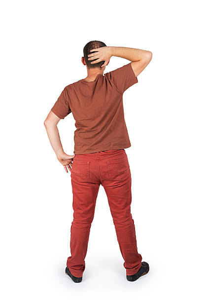 istock Back view of a confused young casual man 521723723