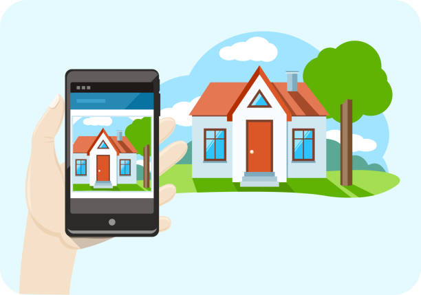 istock Hand holding mobile phone smartphone with house sale offer 521725411