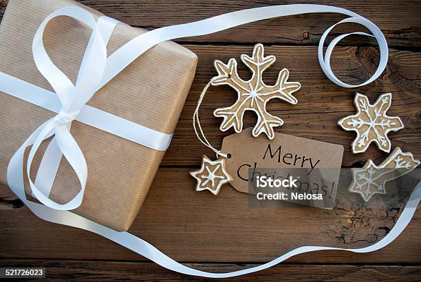 Merry Christmas Greetings With Gift And Cookies Stock Photo - Download Image Now - Backgrounds, Baked, Candy