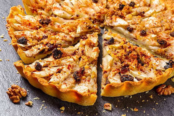 istock apple tart pie with nuts and raisins 521727233