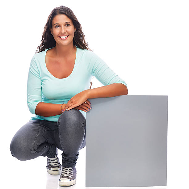 istock Sitting Young Woman Showing Sign 521728245