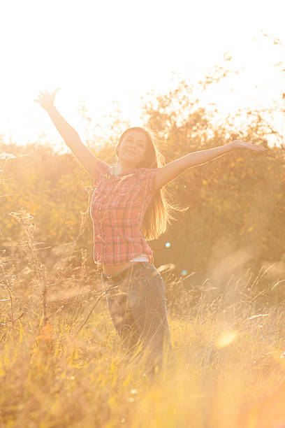 istock Beautiful girl in the park 521729657