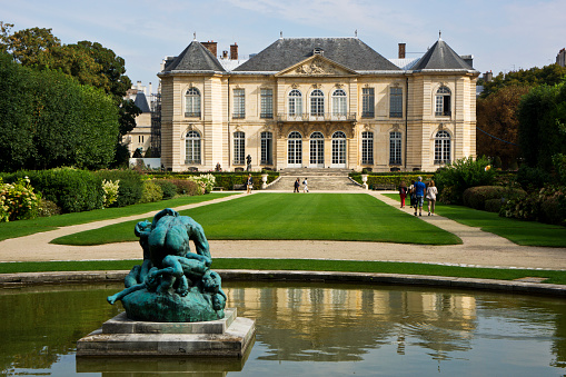 Paris, France, August 27, 2013. Rodin Museum. Image includes the grounds of the museum with several unidentified tourists. 