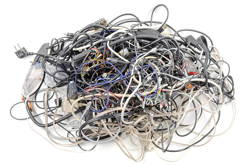 Interwoven tangle of wires on a white background