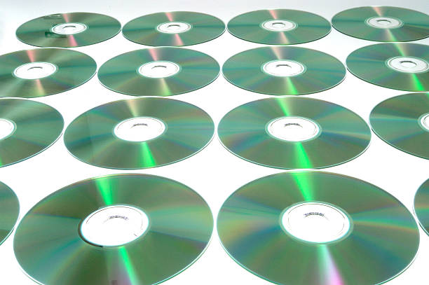 compact discs - dvd cd computer software red - fotografias e filmes do acervo
