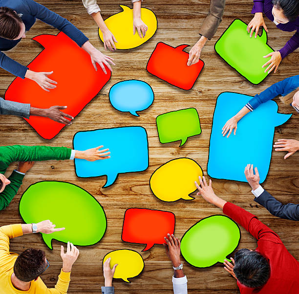 istock Group of Diverse People Holding Speech Bubbles 521757235