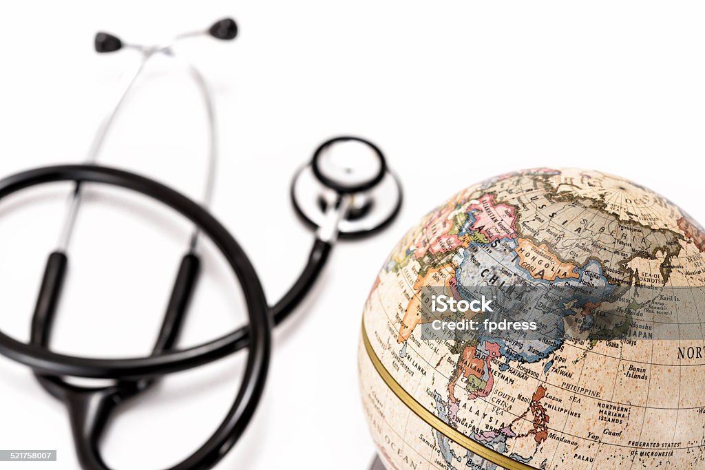 Globe (Asia ) and stethoscope Close-up of Asia in the colorful world map, and stethoscope. Anxiety Stock Photo