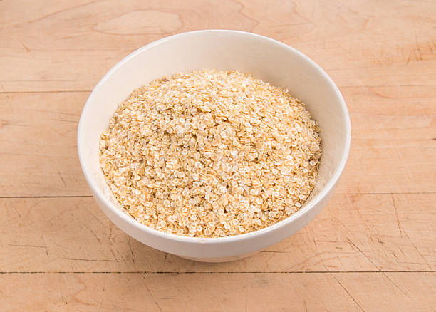 istock Quinoa flakes in a white bowl 521758053