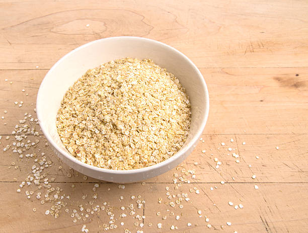 istock Quinoa flakes in a white bowl 521759455