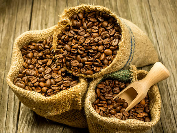 Cтоковое фото Coffee beans в джутовой сумки