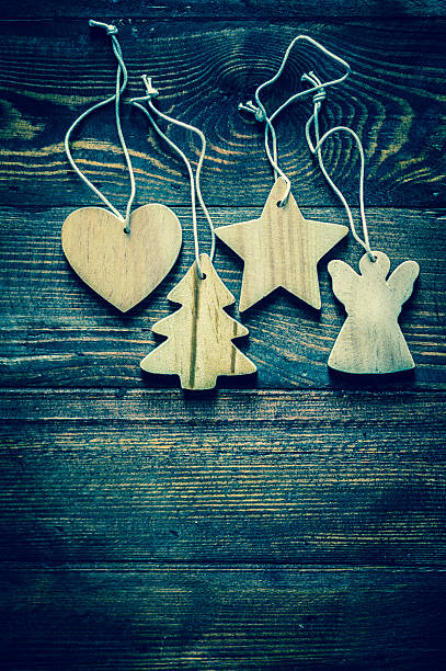 istock Christmas tree decoration on wooden background 521760553