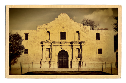 Subject: A retro postcard of the Alamo memorial.