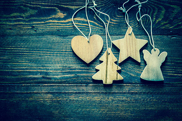 istock Christmas tree decoration on wooden background 521774179