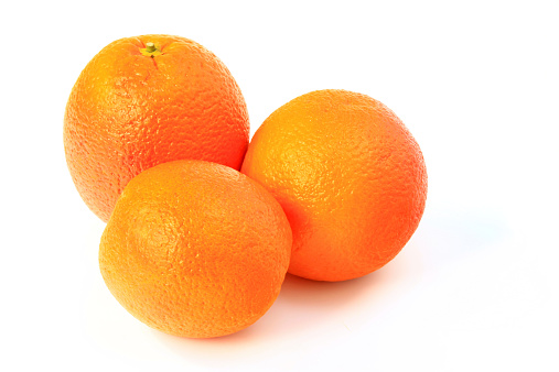 Blood Oranges (Citrus x sinensis), isolated against white background