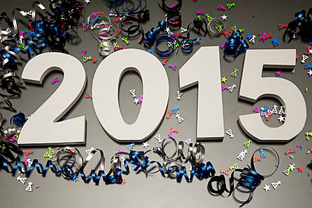 istock New year 2015 and champagne confetti and ribbon 521776455