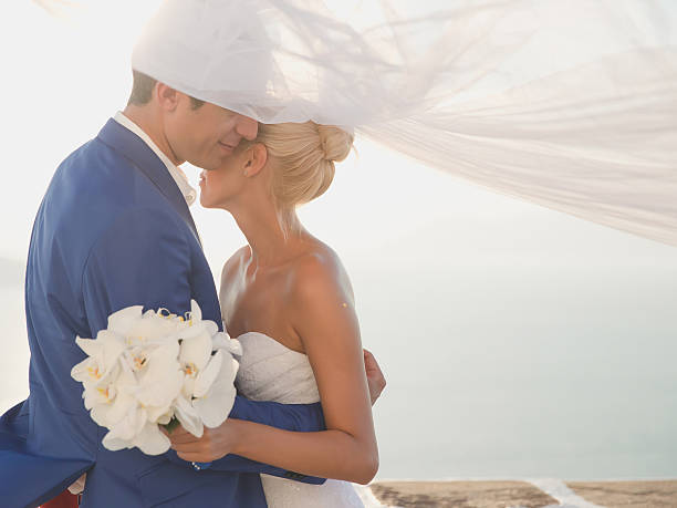 istock Young elegant wedding couple 521777639