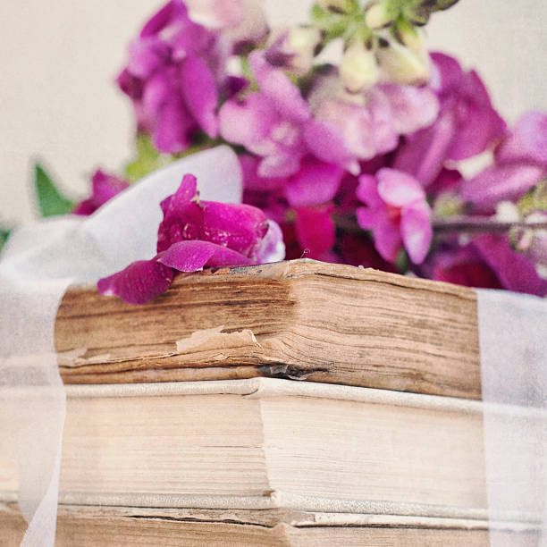 istock Rustic bouquet of snapdragon (Antirrhinum majus) on the old book 521778705