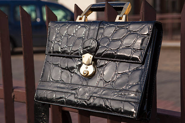 istock Handbag on the fence 521787461