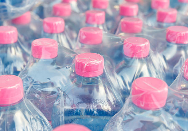 istock screw cap of  water bottles in plastic wrap 521787907