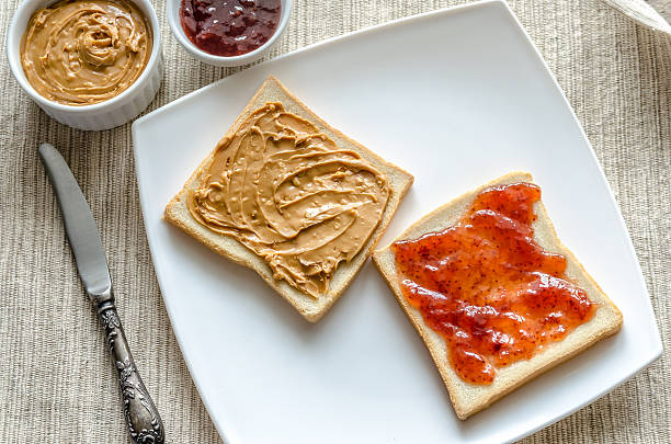 istock Sandwiches with peanut butter and strawberry jelly 521788541