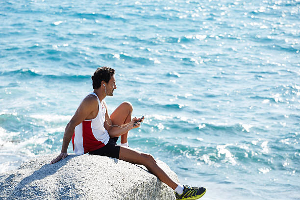 istock Sportsman resting after run 521788735