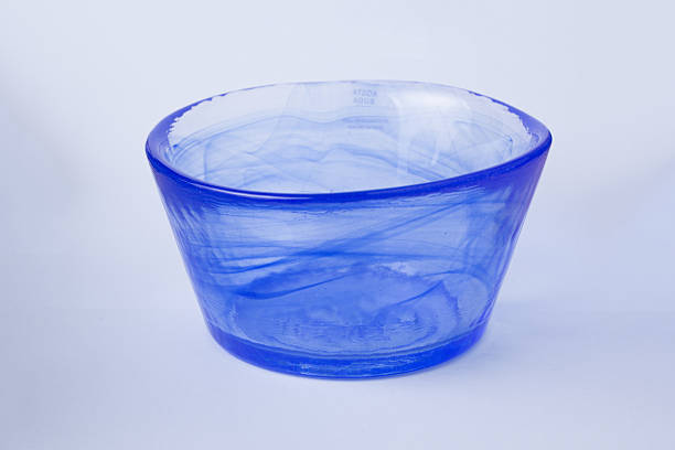 istock Blue glass bowl on a white background 521790561