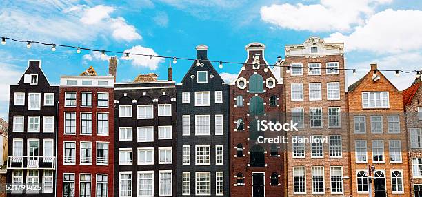 Damrak Street Amsterdam Netherlands Stock Photo - Download Image Now - Amsterdam, Architecture, Autumn