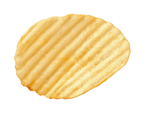 A single wavy potato chip with ridges, sometimes called ruffles, isolated on a white background. A salty snack associated with parties, and watching sporting events. It falls into category of one of Americas favorite junk foods. This snack is notorious for being high in calories. Shot with a Canon EOS-1 Ds Mark II.