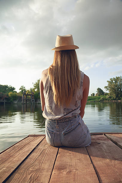 istock Young Girl Enjoying Near River 521792651