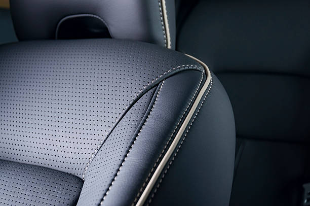 Leather car seats  detail with focus on stitch