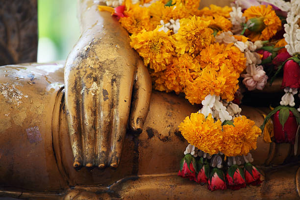 istock colorful garland respect to buddha statue 521795382