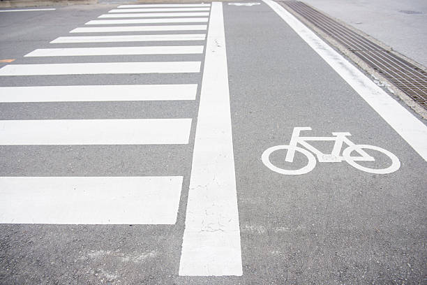istock bike lane on the road 521795392
