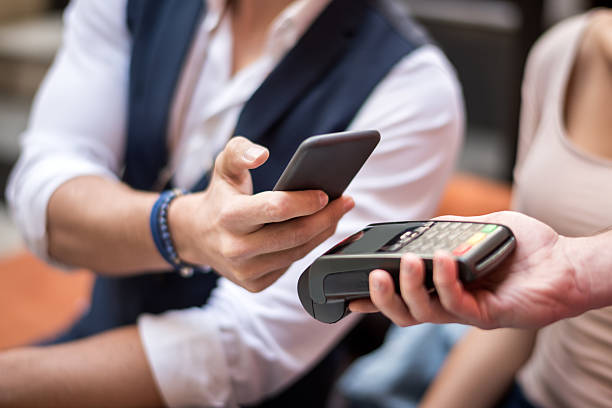istock Contactless payment with mobile phone 521795564