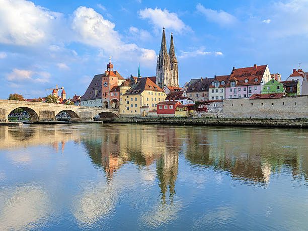 istock Regensburg Cathedral and Stone Bridge over Danube, Germany 521795656